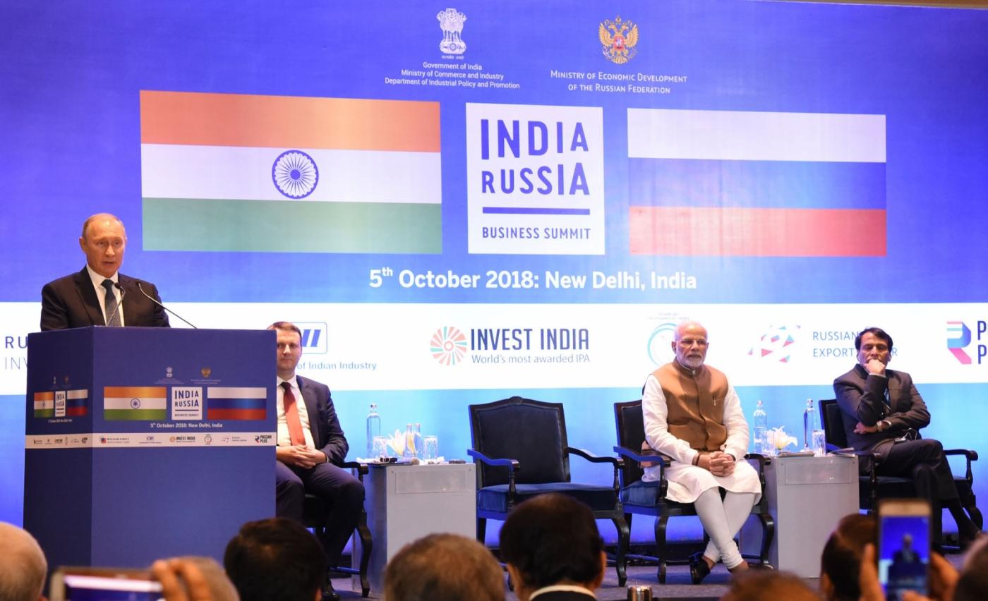 New Delhi: Russian President Vladimir Putin addresses at India-Russia Business Summit, in New Delhi, on Oct 05, 2018. Also seen Prime Minister Narendra Modi and Union Commerce and Industry Minister Suresh Prabhakar Prabhu. (Photo: IANS/PIB) by .