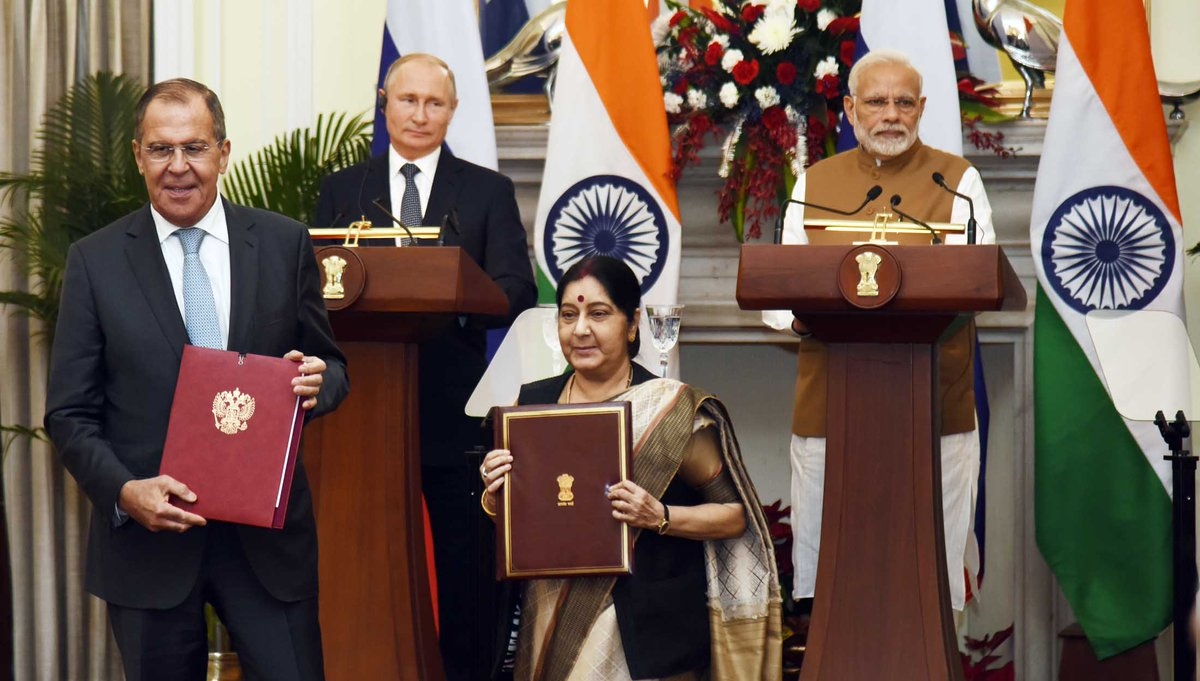 New Delhi: Prime Minister Narendra Modi and Russian President Vladimir Putin witness Russian Foreign Minister Sergey Lavrov and External Affairs Minister Sushma Swaraj exchange India-Russia MoUs, in New Delhi, on Oct 5, 2018. (Photo: IANS/PIB) by .