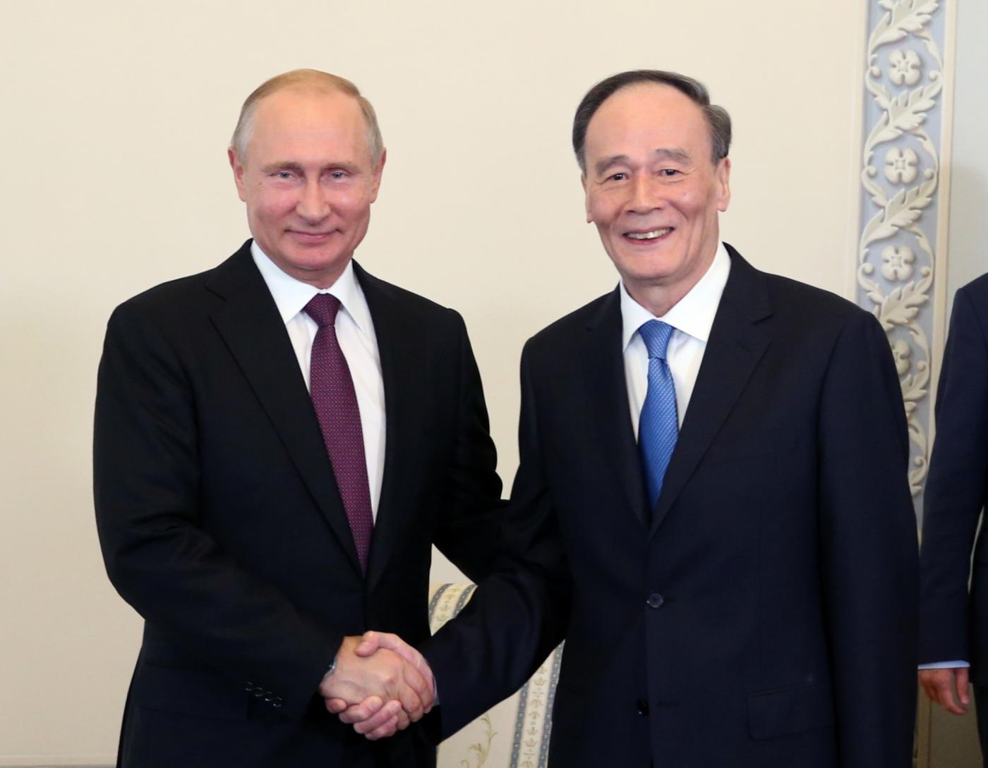 ST. PETERSBURG, May 24, 2018 (Xinhua) -- Chinese Vice President Wang Qishan meets with Russian President Vladimir Putin, in Russia's St. Petersburg, May 24, 2018. (Xinhua/Yao Dawei/IANS) by .