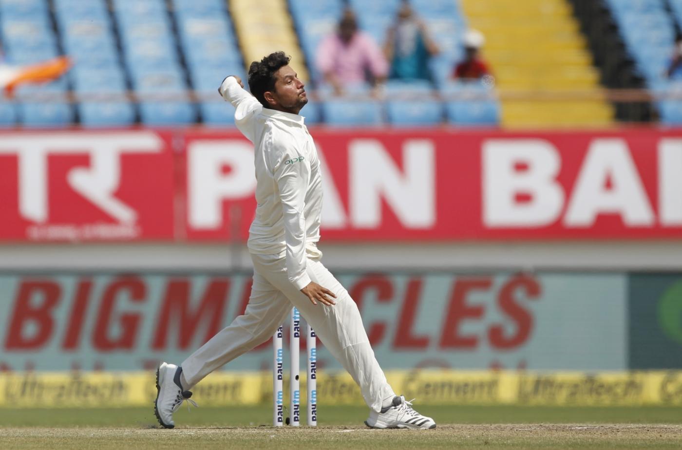 Rajkot: India's Kuldeep Yadav in action on Day 3 of the First Test match between India and West Indies at Saurashtra Cricket Association Stadium in Rajkot on Oct 6, 2018. (Photo: Surjeet Yadav/IANS) by .
