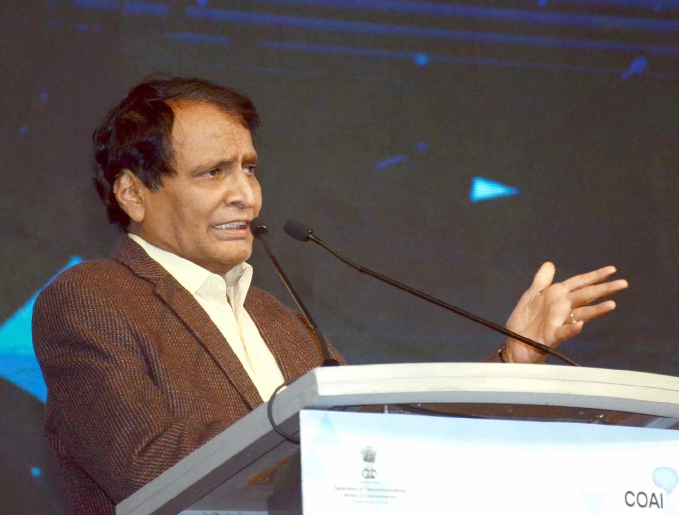 New Delhi: Union Minister for Commerce & Industry and Civil Aviation Suresh Prabhu addresses at the India Mobile Congress - 2018, in New Delhi on Oct 25, 2018. (Photo: IANS/PIB) by .