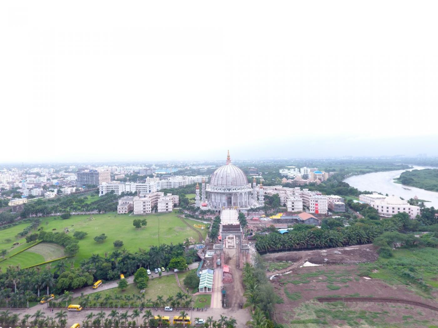 The planet's biggest pillar-less dome, built without a professional architect's design, housing 54 massive bronze statues of some of the greatest leaders of humanity in Pune. The World Peace Monument dome has a diameter of 160 feet, compared with the Vatican Dome's 139.6 feet, and stands 263 feet tall with a bell hanging from the centre, and the prayer hall is of around 30,000 sq ft. by .