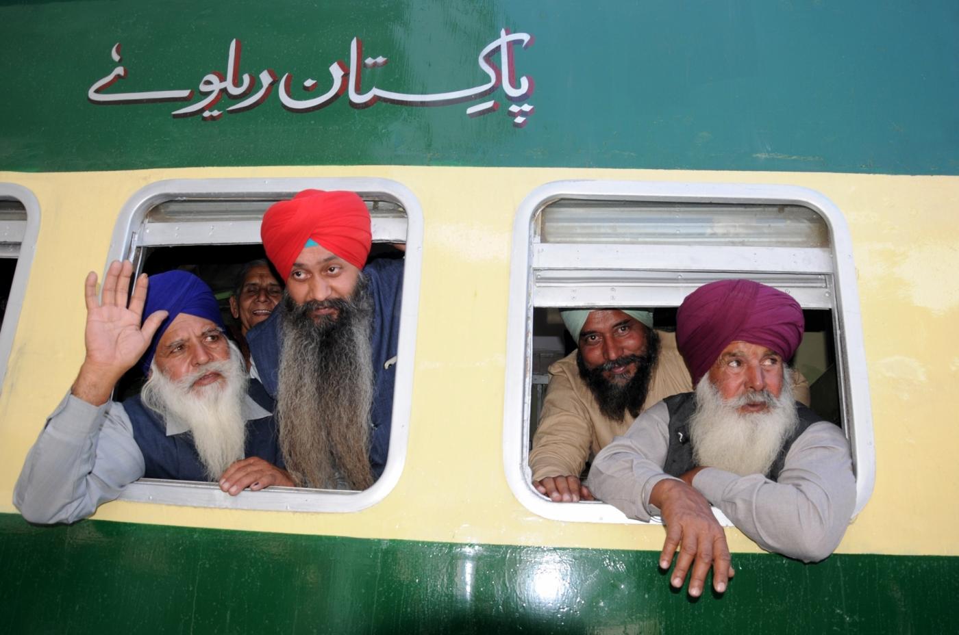Amritsar: Sikh pilgrims leave for Pakistan to participate in the birth anniversary celebrations of 1st Sikh Guru, Guru Nanak Dev to be held at Gurdwara Nankana Sahib, from Amritsar on Nov 21, 2018. (Photo: IANS) by .