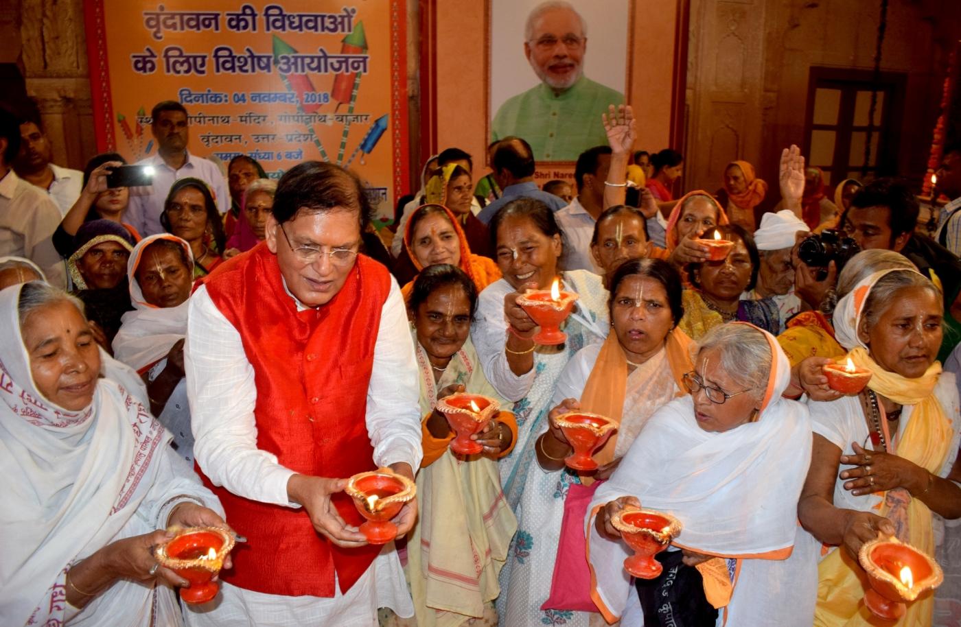 Vrindavan: Sulabh International Founder Bindeshwar Pathak with widows during a programme organised to celebrate Diwali, at Gopinath temple in Vrindavan, Uttar Pradesh on Nov 4, 2018. (Photo: IANS) by .