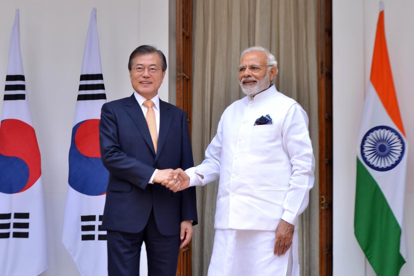 New Delhi: Prime Minister Narendra Modi and South Korean President Moon Jae-in head for a meeting at Hyderabad House, in New Delhi on July 10, 2018. (Photo: IANS) by .