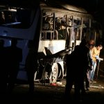 GIZA, Dec. 28, 2018 (Xinhua) -- Photo taken on Dec. 28, 2018 shows the site of an explosion in Giza, Egypt. Two Vietnamese tourists were killed Friday when a home-made bomb hit a bus carrying foreign tourists in Marioutiya area near the Giza Pyramids, Egyptian interior ministry said. (Xinhua/Ahmed Gomaa/IANS) by .