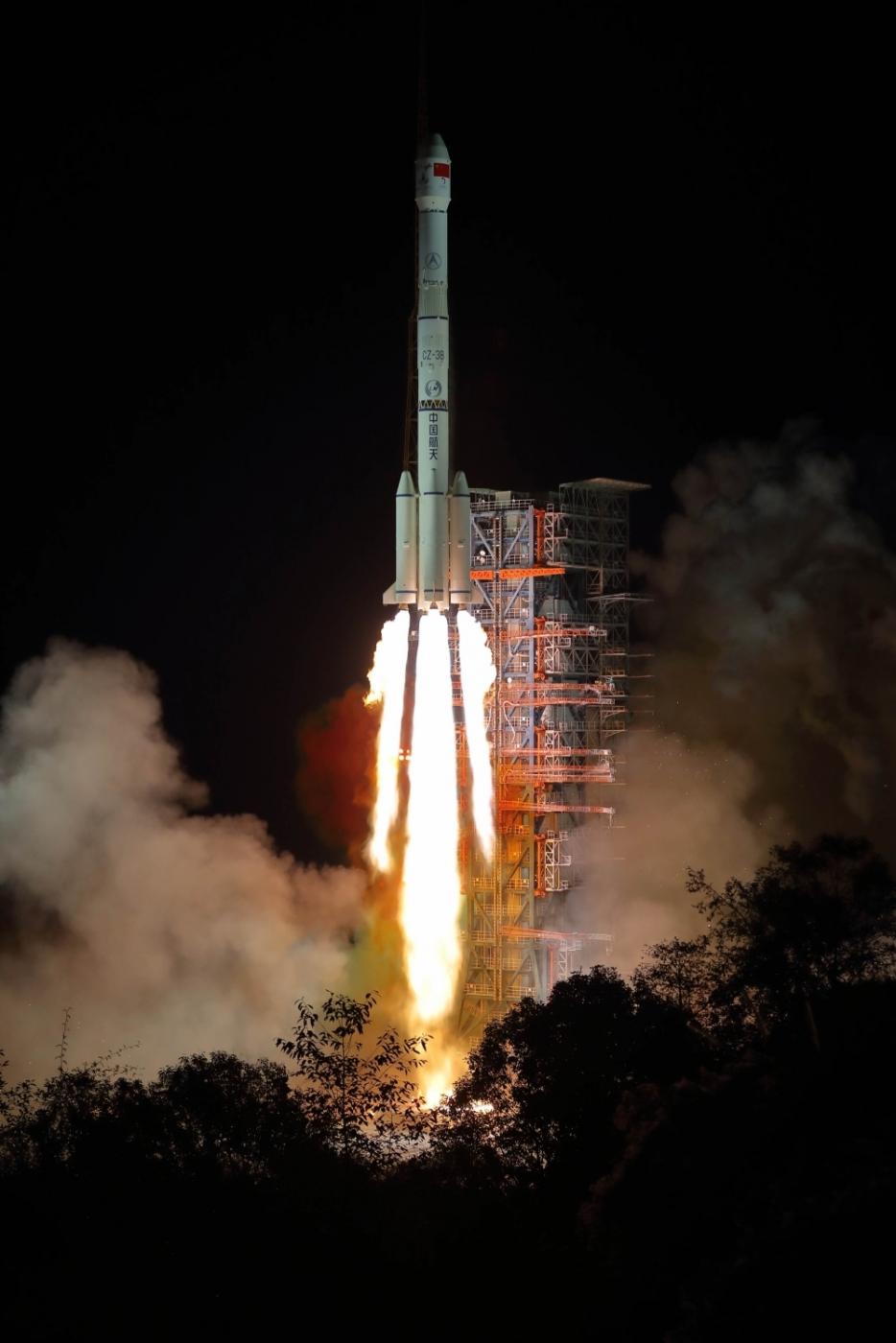 XICHANG, Dec. 8, 2018 (Xinhua) -- China launches Chang'e-4 lunar probe in the Xichang Satellite Launch Center in southwest China's Sichuan Province, Dec. 8, 2018. The probe is expected to make the first-ever soft landing on the far side of the moon. A Long March-3B rocket, carrying the probe including a lander and a rover, blasted off from Xichang at 2:23 a.m., opening a new chapter in lunar exploration. The scientific tasks of the Chang'e-4 mission include low-frequency radio astronomical observation, surveying the terrain and landforms, detecting the mineral composition and shallow lunar surface structure, and measuring the neutron radiation and neutral atoms to study the environment on the far side of the moon, the China National Space Administration announced. China has promoted international cooperation in its lunar exploration program, with four scientific payloads in the Chang'e-4 mission developed by scientists from the Netherlands, Germany, Sweden and Saudi Arabia. (Xinhua/Jiang Hongjing/IANS) by .
