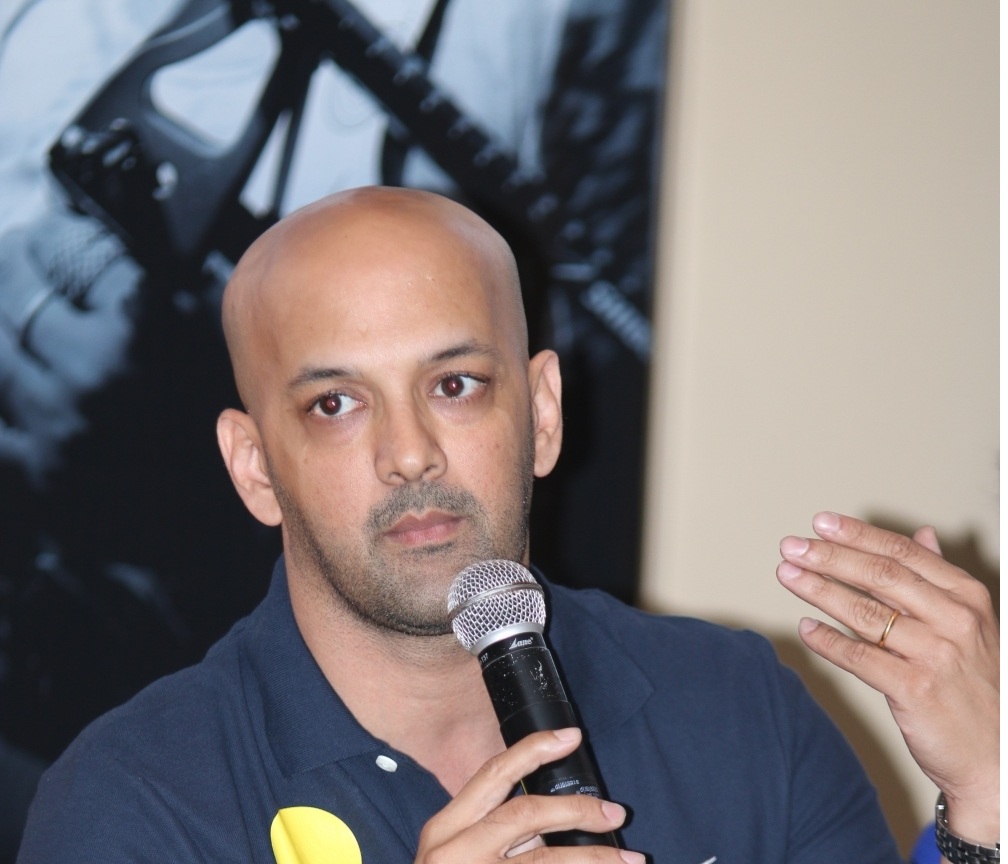 New Delhi: Former hockey player Viren Rasquinha addresses during "Powering the Olympic Gold Dream" - a programme organised by Genpact in New Delhi, on March 17, 2016. (Photo: IANS) by .
