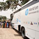 Students ready to board "HP World on Wheels" (WoW), buses that are already driving digital literacy in rural India. by .