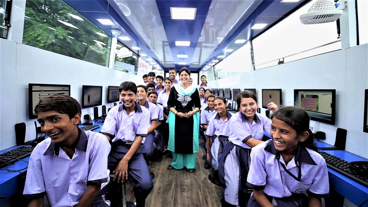 Students aboard "HP World on Wheels" (WoW), buses that are already driving digital literacy in rural India. by .