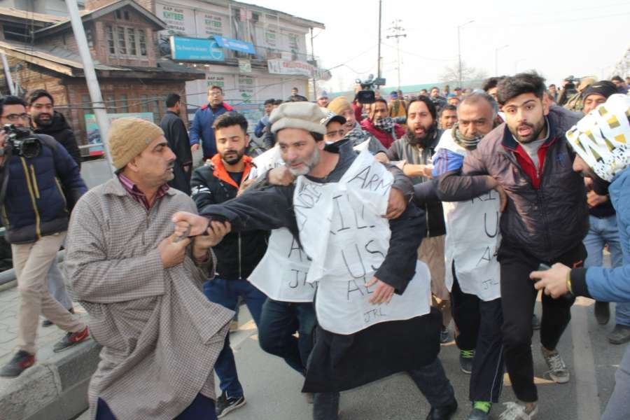 Srinagar: Jammu and Kashmir Liberation Front (JKLF) chairman Yasin Malik detained while he was leading a protest march against the civilian killings which took place in Pulwama district, to the Army headquarters in Srinagar on Dec 17, 2018. (Photo: IANS) by .