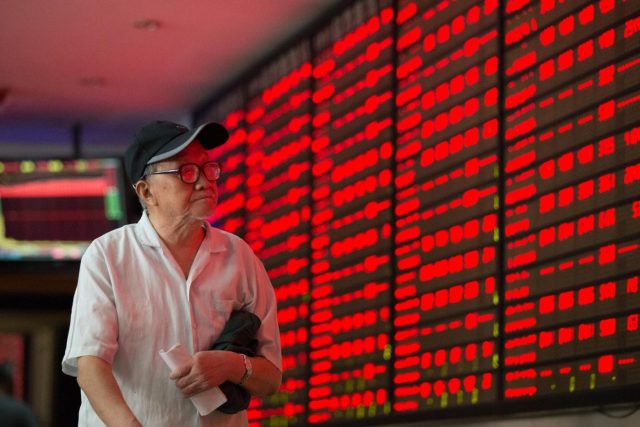 An investor in the trading hall of a Chinese securities firm in Nanjing, China. (File Photo: Xinhua/Su Yang/IANS) An investor in the trading hall of a Chinese securities firm in Nanjing, China. (File Photo: Xinhua/Su Yang/IANS) by .