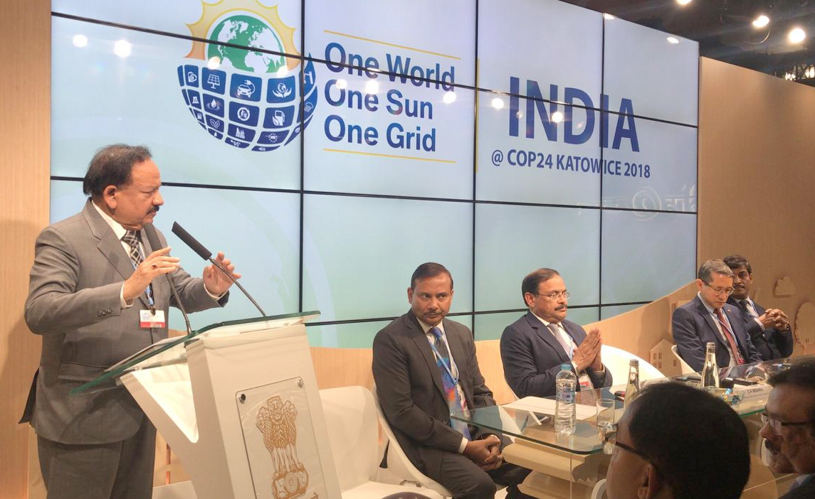 Katowice: Union Minister for Science & Technology, Earth Sciences and Environment, Forest & Climate Change, Dr. Harsh Vardhan addresses at the inauguration of the Indian Pavilion at COP24 in Katowice, Poland on Dec 3, 2018. Also seen Ministry of Environment, Forest and Climate Change Secretary C.K. Mishra. (Photo: IANS/PIB) by .