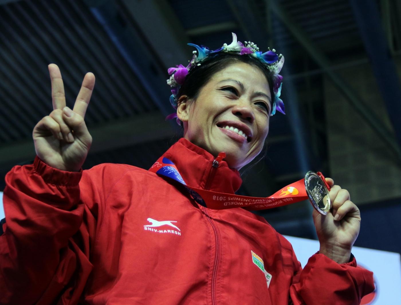 New Delhi: Indian boxing legend M.C. Mary Kom poses with her gold medal after she defeated Ukraine's Hanna Okhota during a final match in the light flyweight 48 kilogram category during the 10th AIBA Women's World Boxing Championships in New Delhi, on Nov 24, 2018. Mary Kom scripted history by clinching a record sixth World Championship Gold medal in the light flyweight 48 kilogram category after outclassing Ukraine's Hanna Okhota 5:0. (Photo: IANS) by .