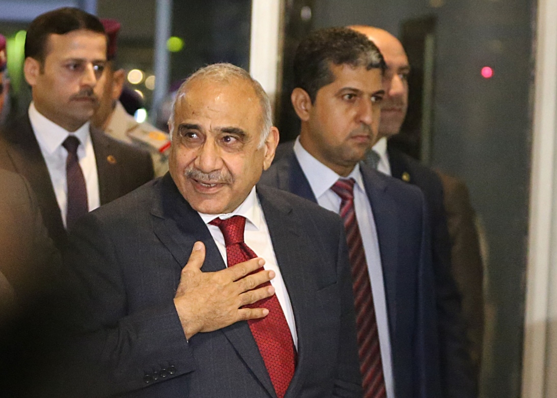 BAGHDAD, Oct. 24, 2018 (Xinhua) -- Adel Abdul Mahdi (Front) arrives at the parliament in Baghdad, Iraq, on Oct. 24, 2018. Adel Abdul Mahdi on Wednesday was sworn in as new prime minister of Iraq after the parliament passed 14 out of his 22 cabinet members. (Xinhua/IANS) by .