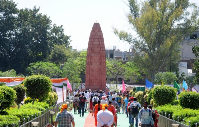 Amritsar: Visitors visit the Jaillanawala Bagh on the 99th anniversary of the Jallianwala Bagh massacre, in Amritsar on April 13, 2018. (Photo: IANS) Amritsar: Visitors visit the Jaillanawala Bagh on the 99th anniversary of the Jallianwala Bagh massacre, in Amritsar on April 13, 2018. (Photo: IANS) by .