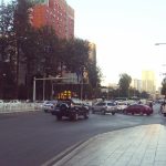 Traffic in downtown Kunming. by .