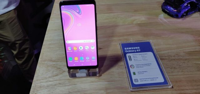 New Delhi: A view of the newly launched Samsung Galaxy A9 on display at the launch of the smartphone in New Delhi, on Nov 20, 2018. Upping the ante in the camera department, South Korean tech giant Samsung on Tuesday brought Galaxy A9, its first smartphone with quadruple primary (rear) camera system, to India. (Photo: IANS) New Delhi: A view of the newly launched Samsung Galaxy A9 on display at the launch of the smartphone in New Delhi, on Nov 20, 2018. Upping the ante in the camera department, South Korean tech giant Samsung on Tuesday brought Galaxy A9, its first smartphone with quadruple primary (rear) camera system, to India. (Photo: IANS) by .