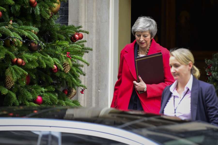 LONDON, Dec. 4, 2018 (Xinhua) -- British Prime Minister Theresa May (L) leaves 10 Downing Street in London, Britain, on Dec. 4, 2018. British MPs on Tuesday voted by 311 to 293 to find ministers in contempt of parliament over their failure to publish the full legal advice on the Brexit deal. (Xinhua/Stephen Chung/IANS) by .