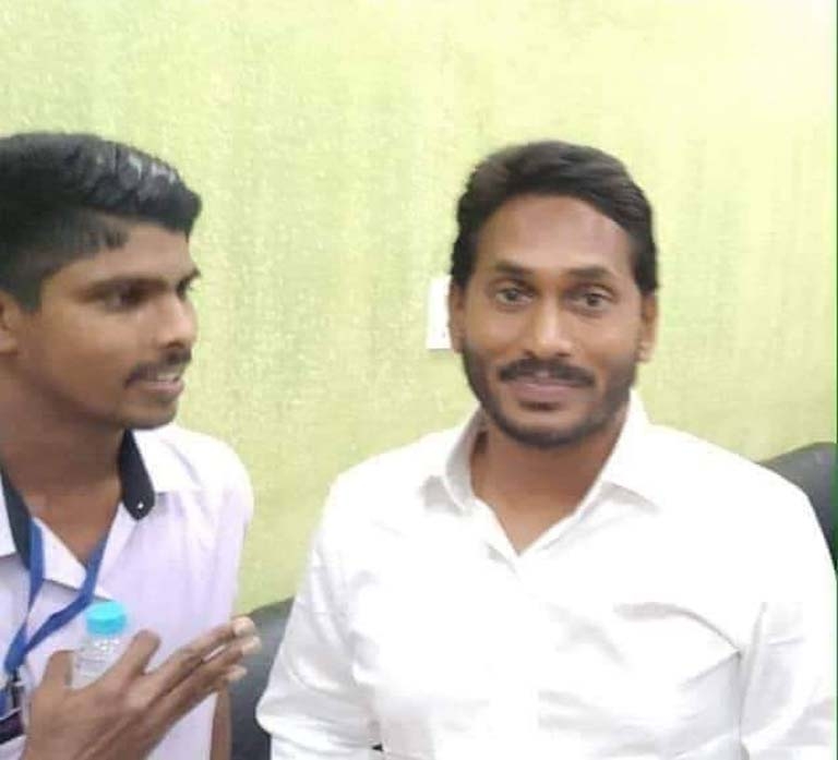 Visakhapatam: Jaripalli Srinivas (L) who attacked YSR Congress Party President Y.S. Jaganmohan Reddy with a knife, according to the police, sneaked up to him with a request to take a selfie, on Oct 25, 2018. The attacker works as a waiter at a restaurant at the airport. A commandant of the Central Industrial Security Force (CISF) overpowered the attacker, who was handed over to police. (Photo: IANS) by .