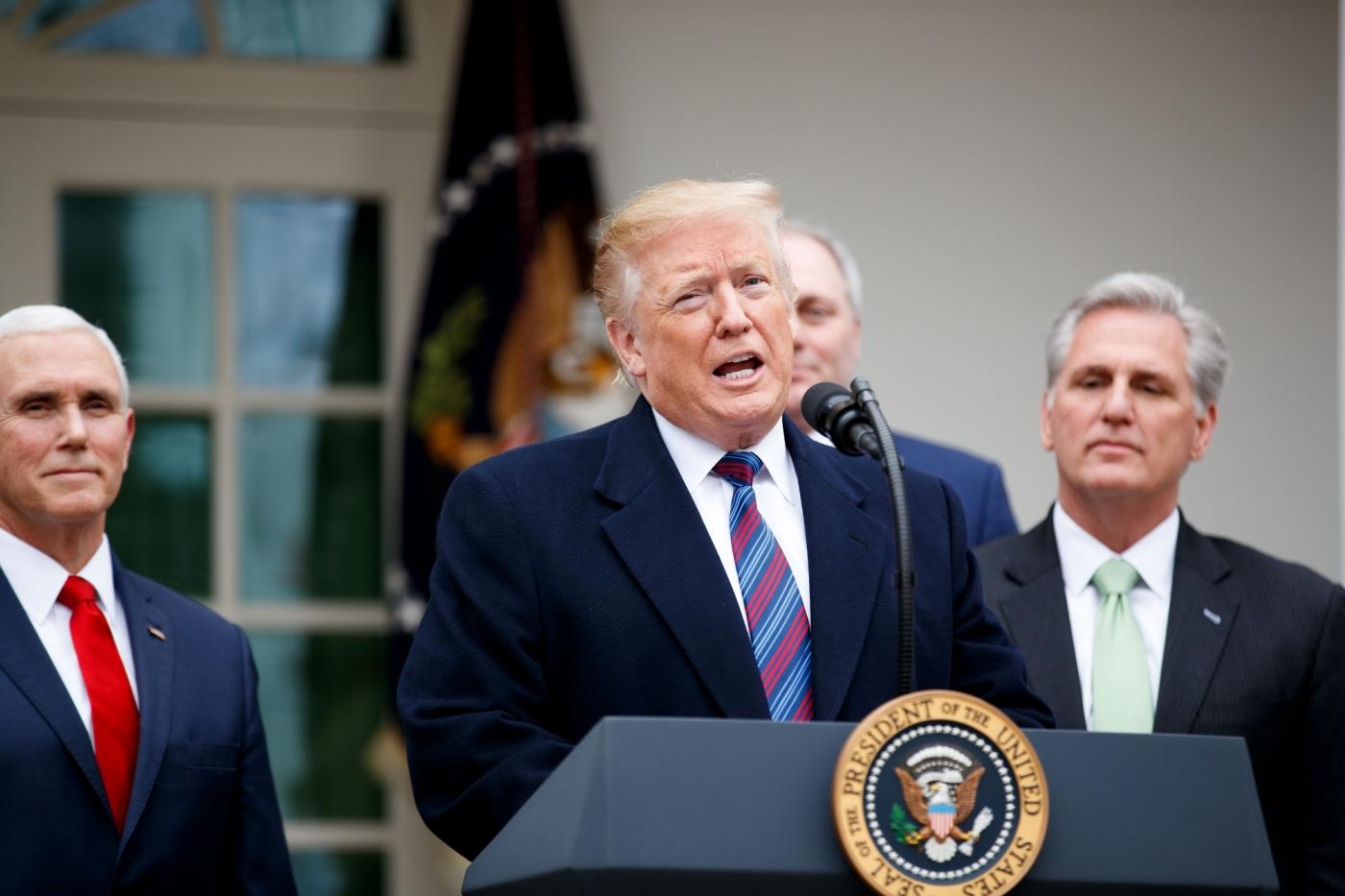 WASHINGTON, Jan. 4, 2019 (Xinhua) -- U.S. President Donald Trump (C) speaks during a press conference at the White House Rose Garden in Washington D.C., the United States, on Jan. 4, 2019. Trump said Friday that he's prepared for a partial government shutdown to last for months or years, after his meeting with Congressional leaders yielded no deal on funding for a U.S.-Mexico border wall. (Xinhua/Ting Shen/IANS) by .