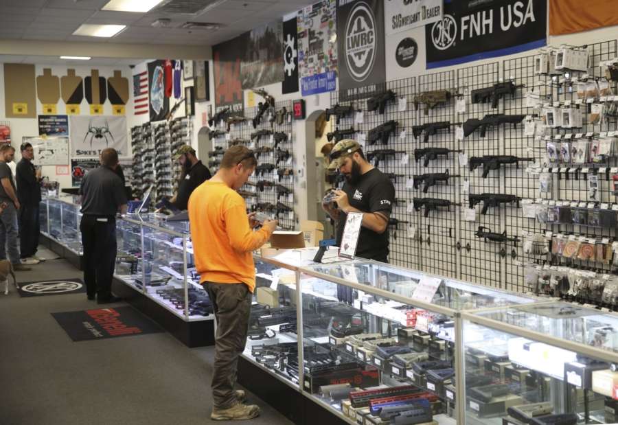 LAS VEGAS, Oct. 5, 2017 (Xinhua) -- People purchase firearms in a gun shop in Las Vegas, the United States, on Oct. 4, 2017. In the wake of the worst mass shooting in U.S. history, Democrats on Wednesday began a push to tighten gun control, although they are unlikely to get far, experts said. (Xinhua/Wang Ying/IANS) by .