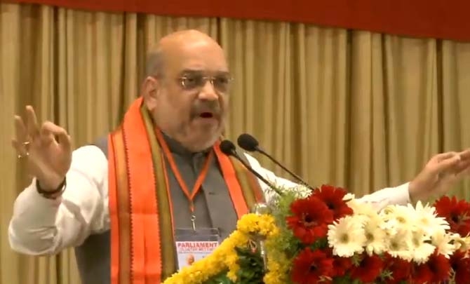 Nizamabad: BJP chief Amit Shah addresses a party meeting in Telangana's Nizamabad, on March 6, 2019. (Photo: IANS/BJP) by .
