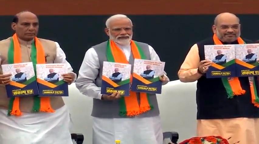 New Delhi: BJP leaders - Prime Minister Narendra Modi, Union Minister Rajnath Singh and party chief Amit Shah release BJP's election manifesto for the 2019 Lok Sabha polls, in New Delhi, on April 8, 2019. (Photo: IANS) by .