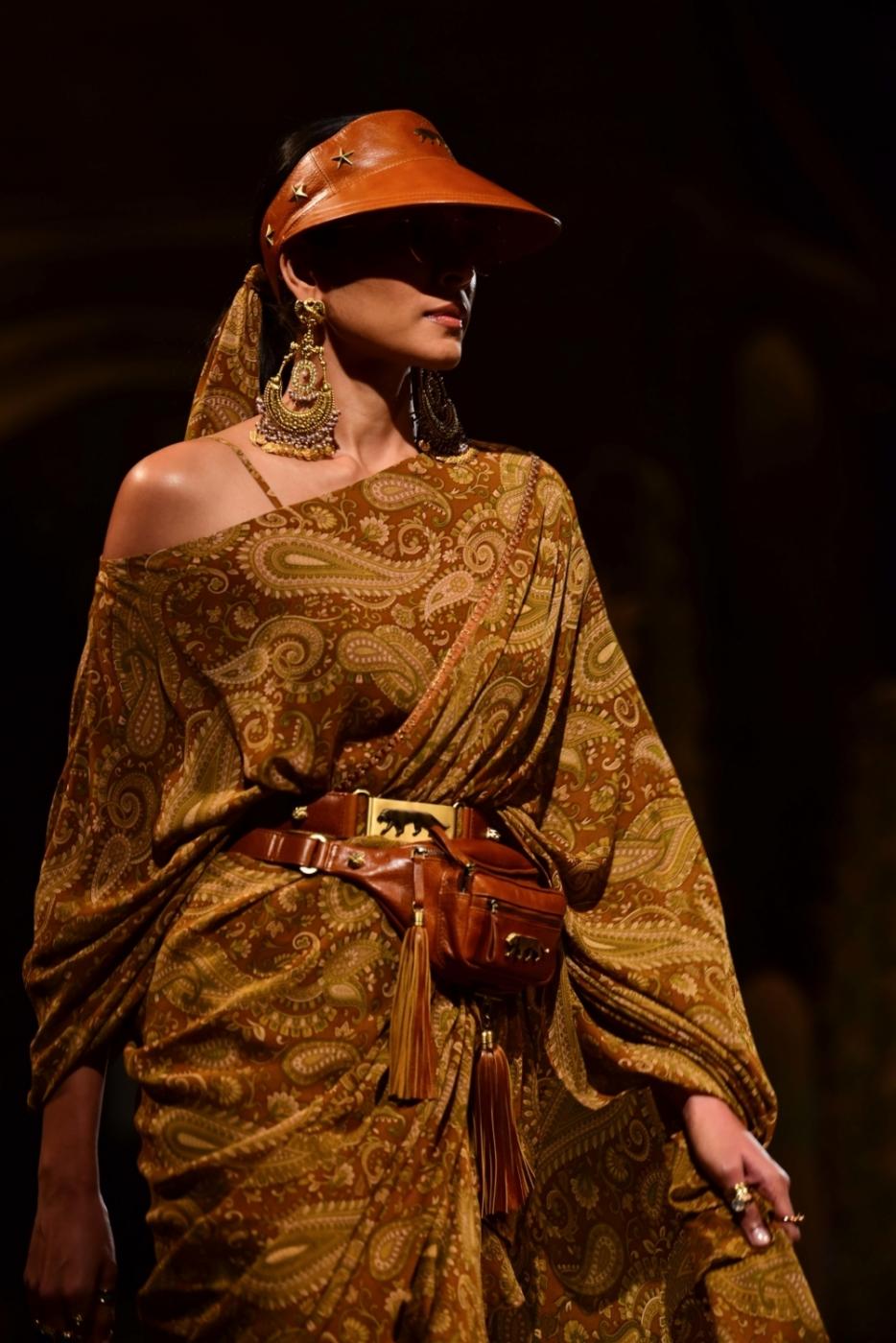 New Delhi: A model showcases "Kashgaar Bazaar" collection, a creation by fashion designer Sabyasachi Mukherjee on the 20th year celebrations of his brand "Sabyasachi", in New Delhi, on April 6, 2019. (Photo: IANS) by .