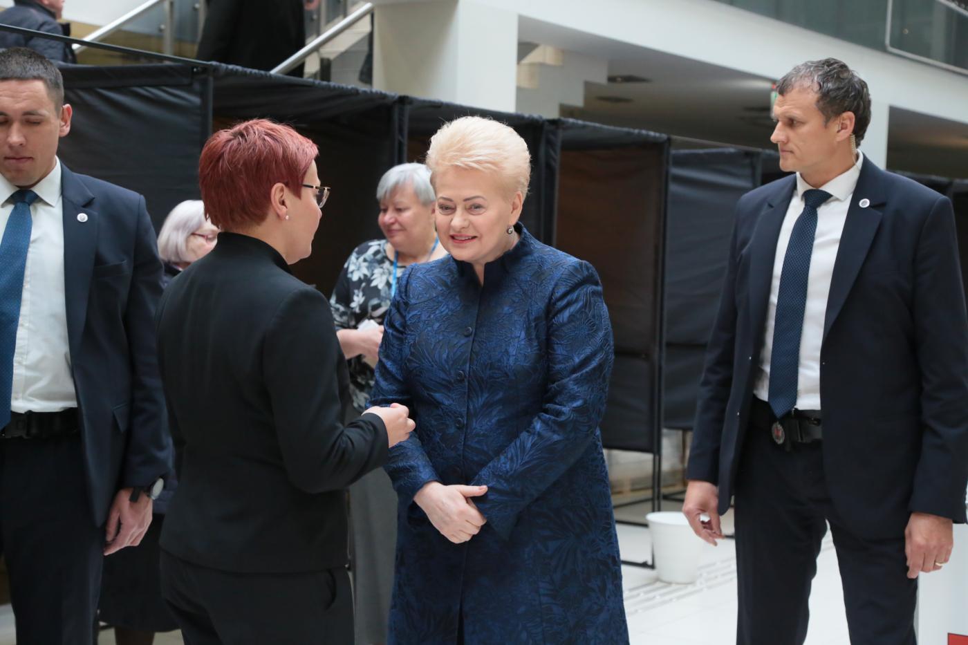 VILNIUS, May 7, 2019 (Xinhua) -- Lithuanian President Dalia Grybauskaite (2nd R) talks with a staff member of the polling station after casting her vote in the presidential elections and the dual citizenship referendum in Vilnius, Lithuania, May 7, 2019. Advance voting kicked off on Monday in the Lithuanian presidential elections and referendums on dual citizenship and the number of parliament members. For the first time in Lithuania, the advance voting is held for five days. (Xinhua/Guo Mingfang/IANS) by .