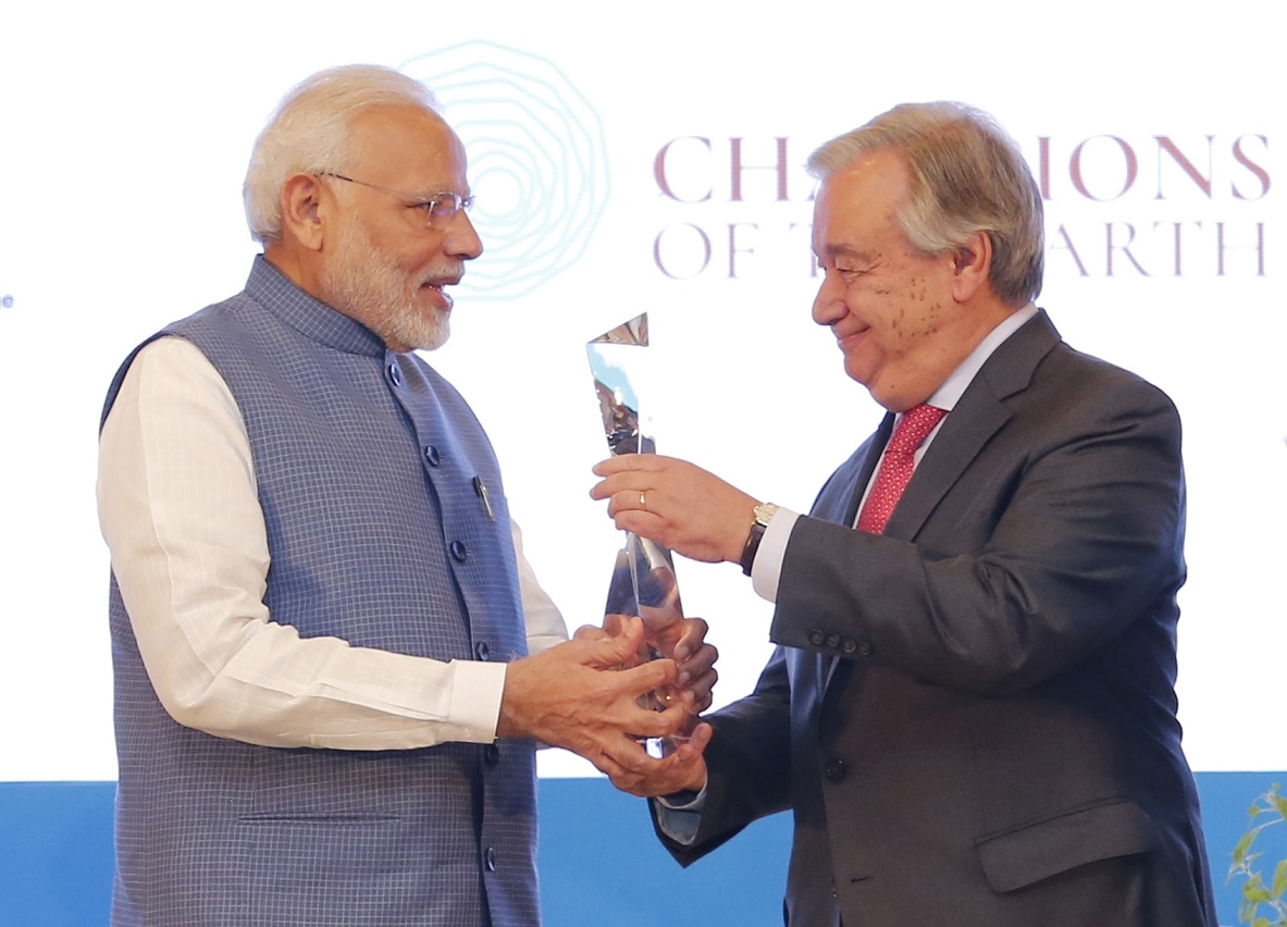 United Nations Secretary-General AntÃ³nio Guterres presents Prime Minister Narendra Modi with the Champion of Earth award, the highest environmental honour of the UN, in New Delhi on October 3, 2018. (Photo: UN/IANS) by .