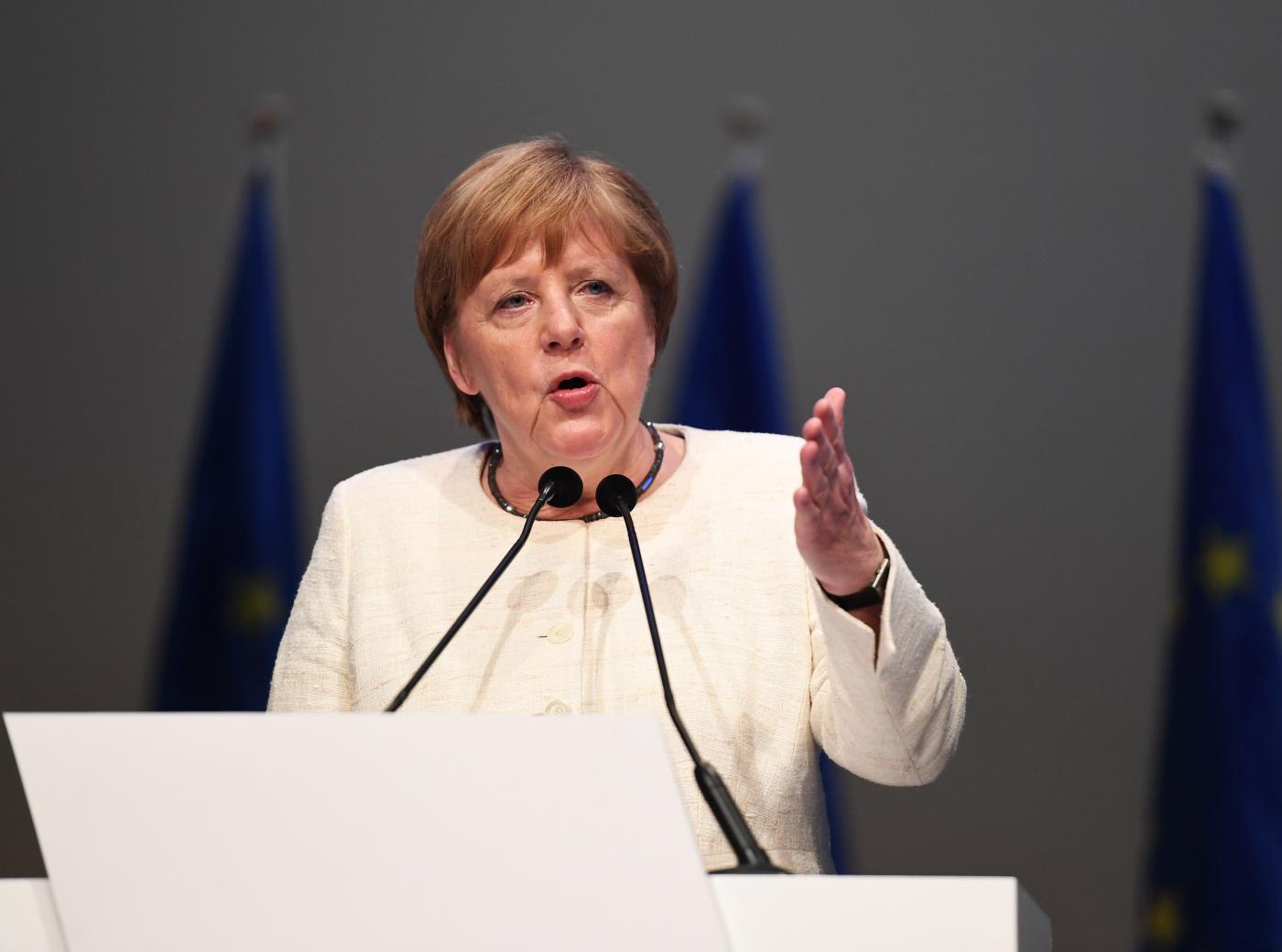 MUNICH, May 24, 2019 (Xinhua) -- German Chancellor Angela Merkel speaks during Manfred Weber's last campaign rally ahead of the election in Munich, Germany, on May 24, 2019. "Europe stands for security and prosperity," Manfred Weber, top candidate of the European People's Party (EPP) for the European elections, said here Friday, calling on voters to defend Europe against nationalism. (Xinhua/Lu Yang/IANS) by .