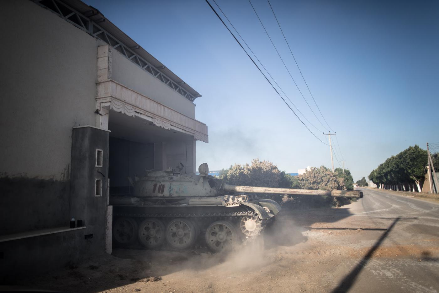 TRIPOLI, May 16, 2019 (Xinhua) -- A tank of UN-backed government forces is seen in Al-Sawani frontline near Tripoli airport in Tripoli, Libya, on May 16, 2019. At least six civilians were reported killed and five more injured in an apparent airstrike in populated areas of the Libyan capital of Tripoli, Stephane Dujarric, spokesman for UN Secretary-General Antonio Guterres, said on Thursday. (Xinhua/Amru Salahuddien/IANS) by Amru Salahuddien.