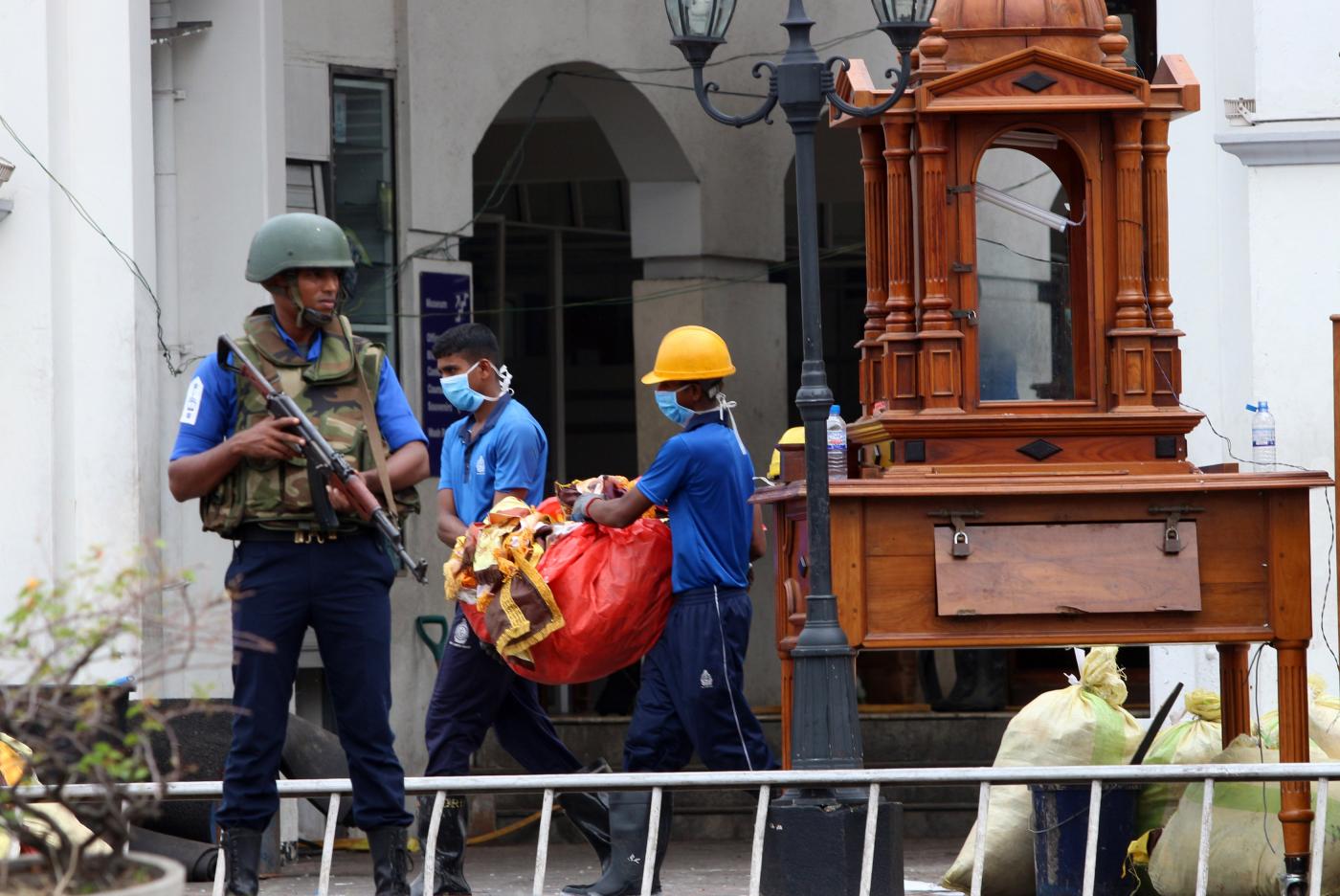 COLOMBO, April 27, 2019 (Xinhua) -- Workers clear away debris and shattered glass amid tight security outside St. Anthony's Church, one of the targets in a series of bomb blasts targeting churches and luxury hotels on Sunday in Colombo, Sri Lanka, on April 27, 2019. (Xinhua/A. Hapuarachchi/IANS) by A.HAPUARACHCHI.