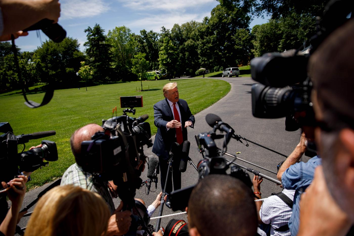 WASHINGTON D.C., May 25, 2019 (Xinhua) -- U.S. President Donald Trump speaks to reporters before leaving the White House in Washington D.C., the United States, on May 24, 2019. Donald Trump said on Friday that his country will send about 1,500 additional troops to the Middle East amid escalating tension with Iran. Trump told reporters at the White House that the extra deployment, which is "relatively small number of troops," is mainly a protective measure. (Xinhua/Ting Shen/IANS) by Ting Shen.