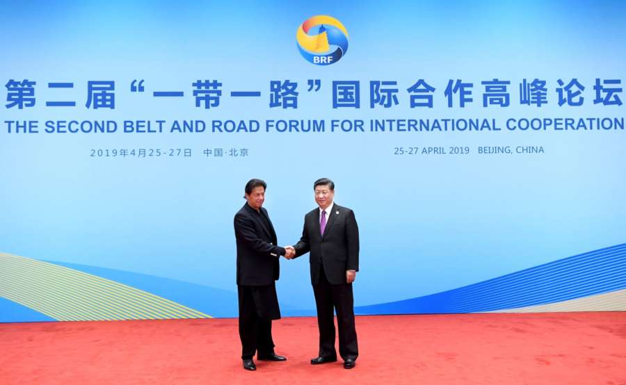 BEIJING, April 27, 2019 (Xinhua) -- Chinese President Xi Jinping shakes hands with Pakistani Prime Minister Imran Khan while welcoming foreign leaders and heads of international organizations attending the leaders' roundtable meeting of the Second Belt and Road Forum for International Cooperation at the Yanqi Lake International Convention Center in Beijing, capital of China, April 27, 2019. (Xinhua/Rao Aimin/IANS) by .