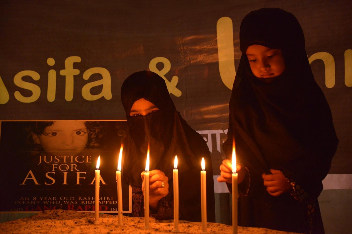 Ajmer: Children light candles to condemn incidents of rape in Unnao (Uttar Pradesh) and Kathua (Jammu and Kashmir) in Ajmer, on April 16, 2018. (Photo: Shaukat Ahmed/IANS) by .