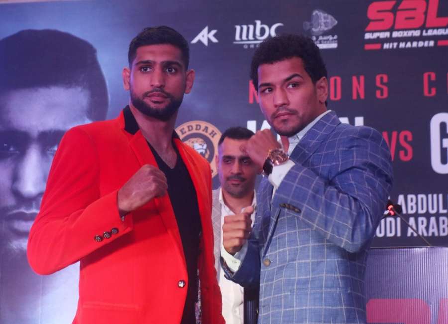New Delhi: Indian boxer Neeraj Goyat and British boxer Amir Khan during a press conference ahead of their face off at the World Boxing Championship that will take place on July 12, 2019 at the King Abdullah Sports City in Jeddah, Saudi Arabia; in New Delhi on May 31, 2019. (Photo: IANS) by .