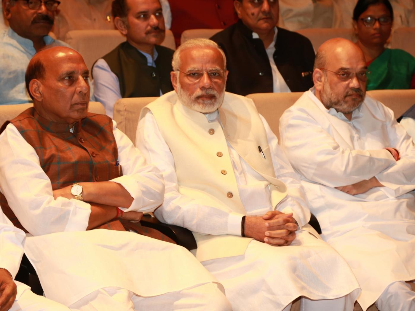 New Delhi: Prime Minister Narendra Modi with party president Amit Shah (R) and Rajnath Singh (L) at BJP parliamentary party meeting at Parliament House on March 13, 2018. (Photo: Amlan Paliwal/IANS) by .