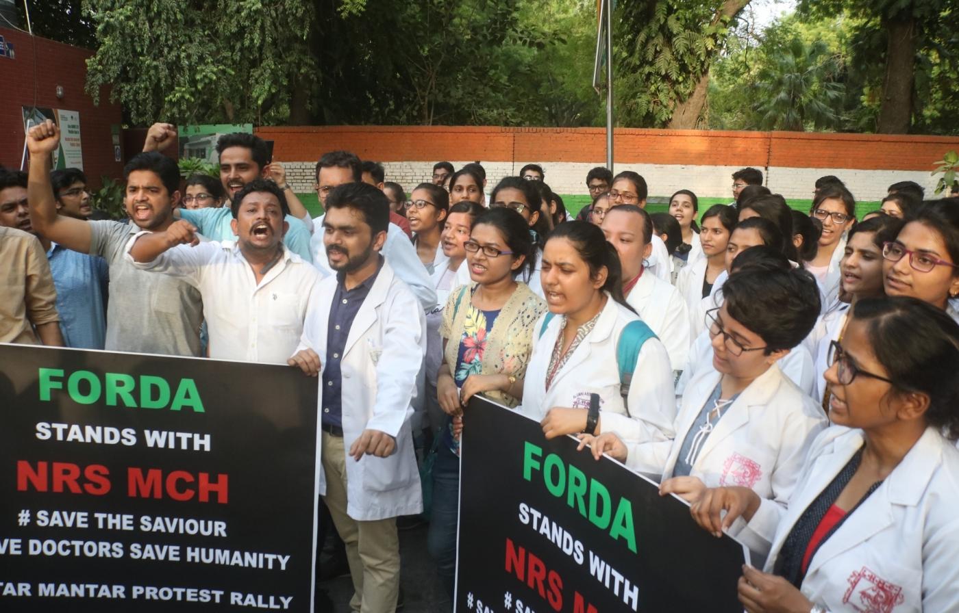 New Delhi: Medical students stage a demonstration against the recent attacks on doctors in Kolkata; in New Delhi on June 13, 2019. (Photo: IANS) by .