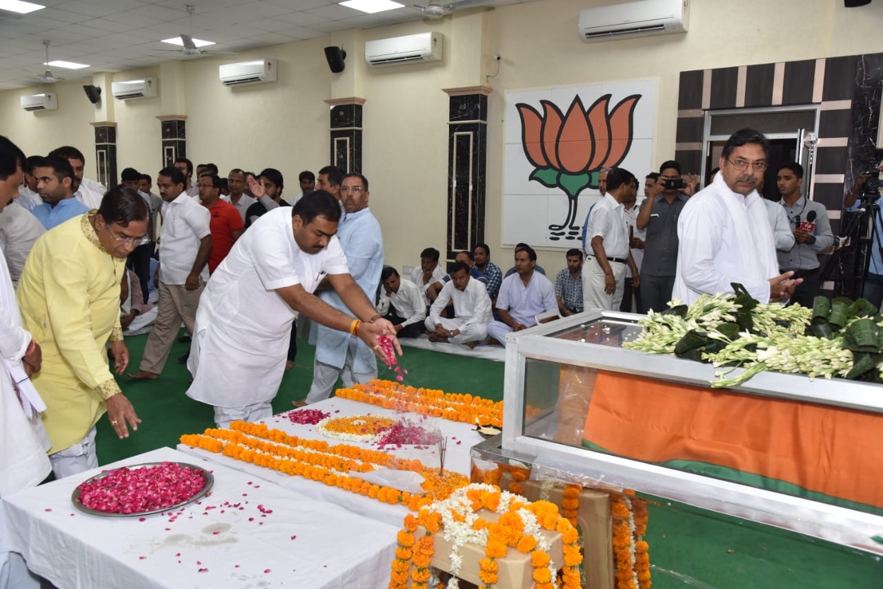 Jaipur: BJP workers pays tributes to state BJP chief Madan Lal Saini at the party state headquarters, in Jaipur on June 25, 2019. Saini, who was admitted at the All India Institute of Medical Sciences in New Delhi last week after a lung infection, died on Monday. He was 75. (Photo: IANS) by .