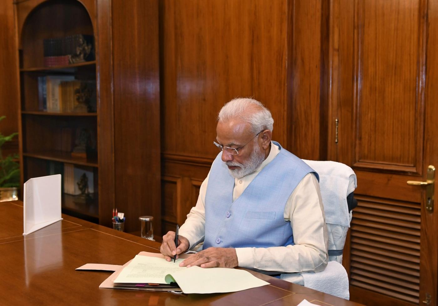 New Delhi: Prime Minister Narendra Modi takes charge of the office of the Prime Minister of India at South Block, in New Delhi on May 31, 2019. (Photo: IANS/PIB) by .