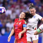 LYON, July 3, 2019 (Xinhua) -- Alex Morgan (L) of the United States and Lucy Bronze (C) of England head for the ball during the semifinal between the United States and England at the 2019 FIFA Women's World Cup at Stade de Lyon in Lyon, France on July 2, 2019. (Xinhua/Chen Yichen/IANS) by Chen Yichen.