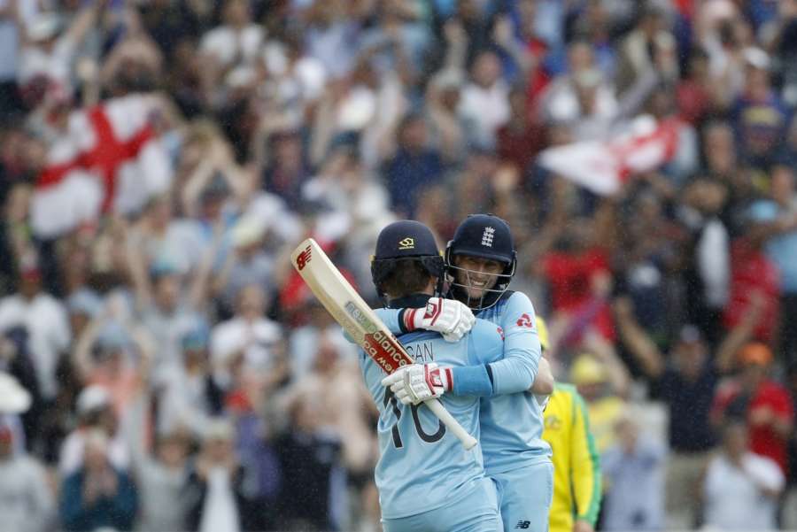 Birmingham: England's Eoin Morgan and Joe Root celebrate after winning the second semi-final match of the 2019 World Cup between against Australia at the Edgbaston Cricket Stadium in Birmingham, England on July 11, 2019. England won by 8 wickets. (Photo: Surjeet Kumar/IANS) by .