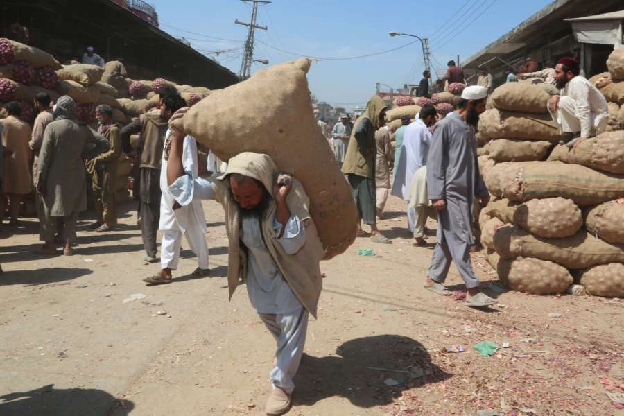 ISLAMABAD, May 6, 2019 (Xinhua) -- A man carries a sack of vegetable at a fruit and vegetable market ahead of the Ramadan in Islamabad, capital of Pakistan on May 6, 2019. (Xinhua/Ahmad Kamal/IANS) by Ahmad Kamal.
