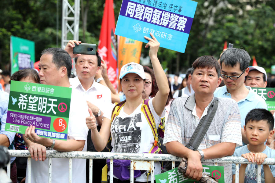 HONG KONG, Aug. 3, 2019 (Xinhua) -- People take part in a rally to denounce violence and support police force at Victoria Park in Hong Kong, south China, Aug. 3, 2019. Tens of thousands of Hong Kong residents gathered at a park on Saturday afternoon to express their strong opposition to violence and firm support to the police force. (Xinhua/Wu Xiaochu/IANS) by Wu Xiaochu.