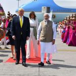 Ahmedabad: Prime Minister Narendra Modi receives US President Donald Trump and First Lady Melania Trump on their arrival at the Sardar Vallabhbhai Patel International Airport in Ahmedabad on Feb 24, 2020. A red carpet welcome was given to Trump and Melania on Monday amid sounds of conch shells after their Air Force One landed at Ahmedabad Airport. Trump is accompanied by his daughter Ivanka and a 12-member delegation. (Photo: IANS/MEA) by .