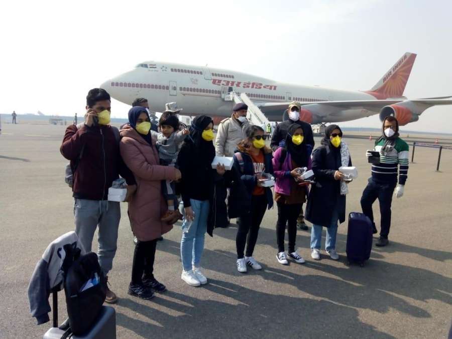 New Delhi: The seven Maldivian citizens who were also evacuated along with 323 Indian nationals from the Chinese city of Wuhan, the epicentre of the novel coronavirus outbreak; at the IGI airport in New Delhi on Feb 2, 2020. National carrier Air India's second special flight to the Chinese city of Wuhan landed at the IGI airport here on Sunday with 323 Indian and seven Maldivian citizens onboard. (Photo: IANS) by .