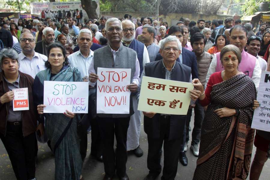 New Delhi: CPI(M) general secretary Sitaram Yechury, CPI general secretary D Raja and CPI(M) leader Brinda Karat particiapte in a rally against violence and condemned the clashes between pro and anti-CAA groups in Delhi; in New Delhi on Feb 26, 2020. (Photo: IANS) by .