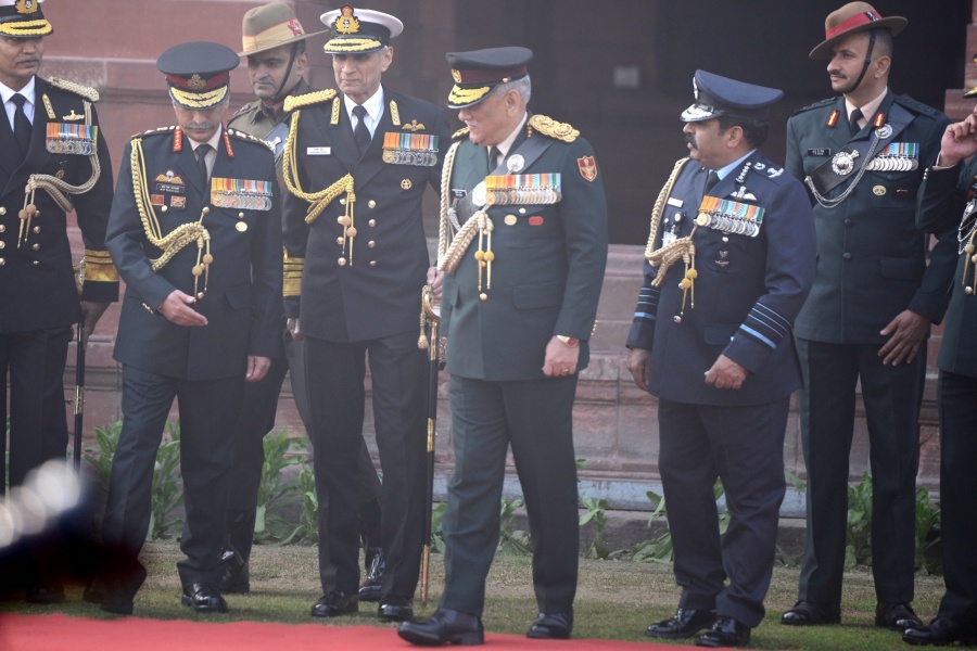 New Delhi: General Bipin Rawat with Army Chief Manoj Mukund Naravane, Air Chief Marshal Rakesh Kumar Singh Bhadauria and Navy Chief Karambir Singh during a guard of honour accorded to him by all the three forces as he took charge as India's first Chief of Defence Staff, in New Delhi on Jan 1, 2020. (Photo: IANS) by .